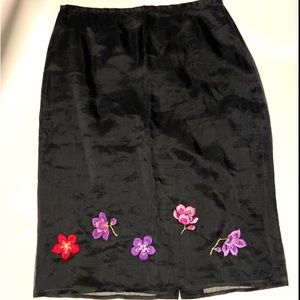 AnnTaylor Silk pencil skirt. Black/ embroidered flowers. 24” long. Size…
